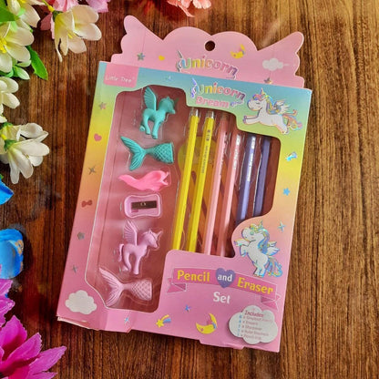 Unicorn-themed pencil and eraser set packaging on a wooden surface with flowers.