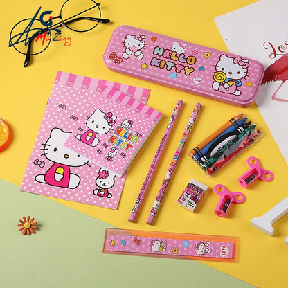 Hello Kitty stationery set including a pencil case, notebook, pencils, eraser, and ruler on a colorful background.